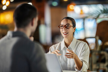 Business people discussing ideas in a modern office