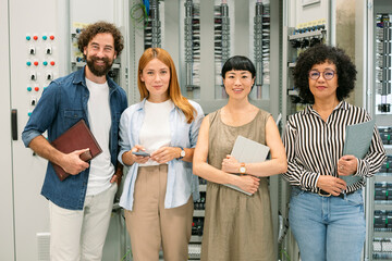 Business team meeting in server room for innovation and renewable energy