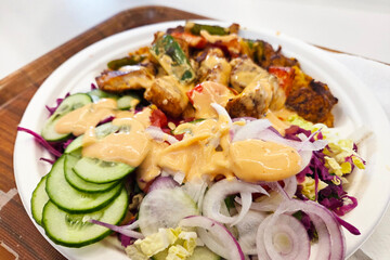 Fresh and Flavorful Mediterranean Salad with Grilled Vegetables and Creamy Dressing