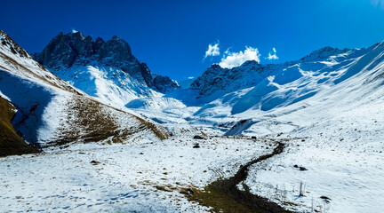 Panoramic view Winter Trek in the High Alpine Wilderness and Winter in Truso Valley of the Georgian Mountains