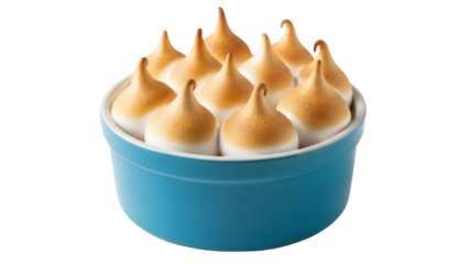 Isolated baked meringue kisses in blue ramekin dish, homemade dessert or confection