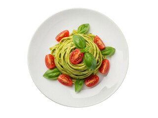 Isolated plate of spaghetti pasta with pesto sauce, halved tomatoes and basil leaves, vibrant color
