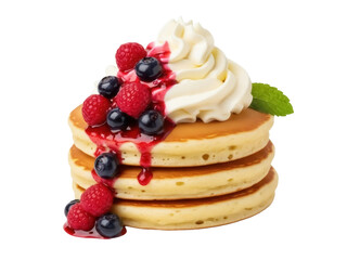 Isolated stack of pancakes with whipped cream, fresh raspberries and blueberries and syrup