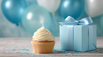 Blue themed birthday cupcake with candle and gift