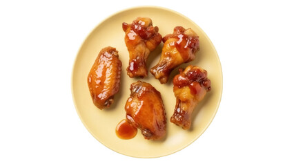 Isolated plate of chicken wings glazed with delicious sauce, an easy fast food appetizer
