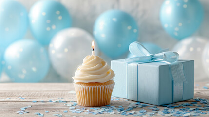 Sweet vanilla cupcake with birthday candle and blue present