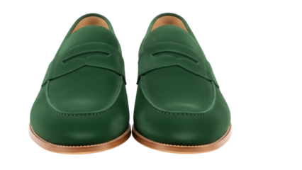 Isolated pair of green leather penny loafers for men, classic footwear for dress or casual wear