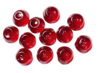 Isolated spiced drops candies, tasty red sweets, delicious chewy treats for kids and adults