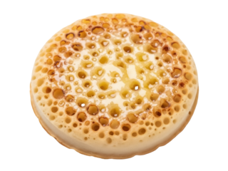Isolated Crumpet with holes and butter, delicious breakfast, English traditional treat