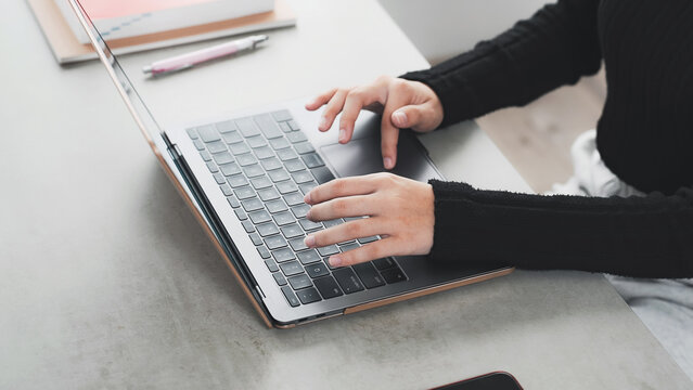 Woman working on a laptop
