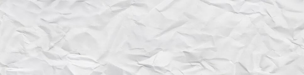 Wrinkled white paper texture showcasing soft folds, natural creases, and organic imperfections. Ideal for design overlays, backgrounds, creative projects, stationery themes, and mockup use.