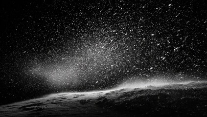 Obraz premium Black and white scene shows an abstract winter landscape; snowing and blowing snow on the ground