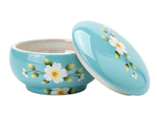 Isolated ceramic dish with lid, floral design in teal and yellow, for soap or cosmetic