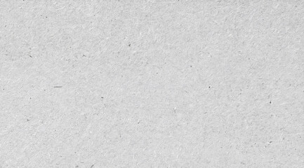 High-resolution gray recycled paper texture featuring natural fibers and soft grain. Ideal as a neutral background for design, packaging, crafting, presentations, and branding projects.
