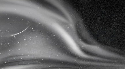 Abstract monochrome background with flowing smoke, dust particles, and cosmic grunge pattern. Ideal for dreamy, space-inspired, or sci-fi digital artwork and motion designs.