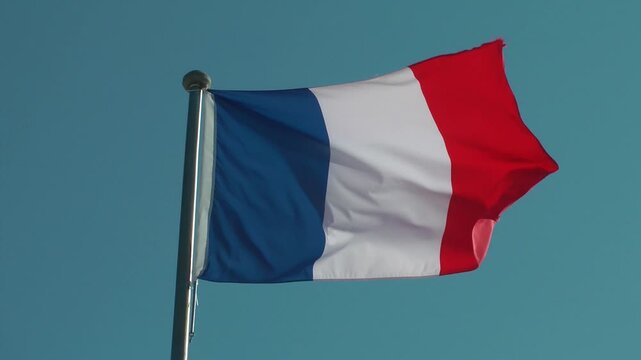 A French flag is flying
