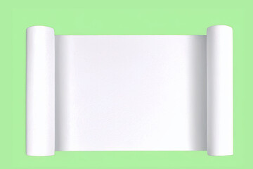 両端を丸めた白い紙