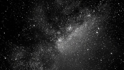 Obraz premium A monochrome depiction of the expansive cosmos filled with luminous stars and nebulous clouds