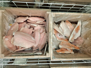 Frozen fish, seafood in a supermarket refrigerator