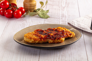 Roasted breaded crispy pork schnitzel