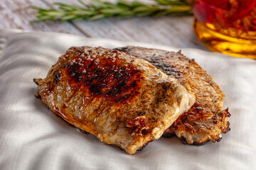 Roasted pork schnitzel steak piece