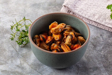 Peeled mussels heap in the bowl