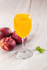 Vitamin beverage - peach juice glass