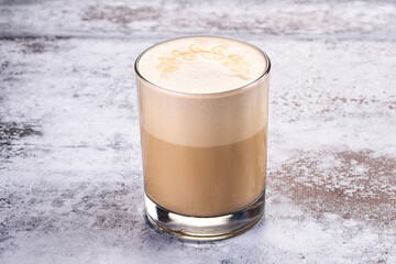 Hot latte beverage in the glass