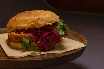 Highquality chicken served chicly, Exquisite toasted chicken sandwich with colorful slaw and fresh crisp greens presented appealingly for promotional images