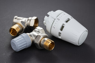 Thermostatic radiator valves TRV . Self-regulating three axis valve with the possibility of connecting electric heating element