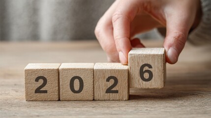 The inscription "2026" on wooden cubes, the concept of the new 2026