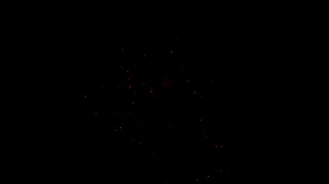 Sharp, spiky red firework starburst explodes with energy on black background. Ideal for dynamic holiday and celebration overlays
