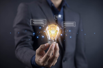 A businessman holding a glowing light bulb with AI icons, symbolizing artificial intelligence innovation, smart technology, future ideas, digital transformation, and advanced solutions.