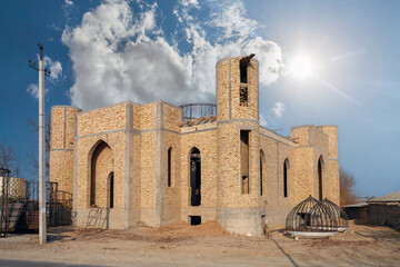 Construction of a dome of a mosque in a city on a vacant lot.