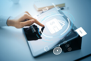 Woman using digital wallet application on tablet device with futuristic interface on light background, representing secure online payment concept.