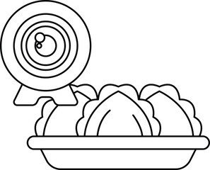 A camera lens is placed above a plate of food