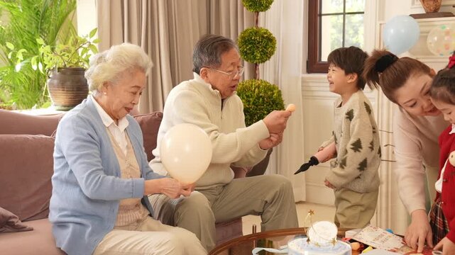 Happy family having a birthday party