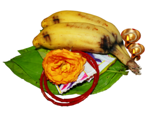 South Indian prayer items banana with Green betel leaf and pakku isolated on transparent background.