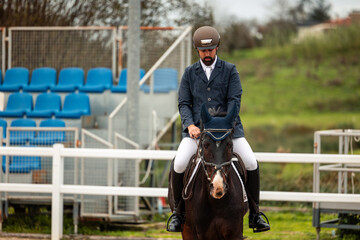 Rider on horse preparing for equestrian competition