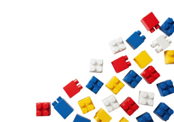 Photorealistic studio flat lay of scattered vibrant red, deep blue, sunny yellow, and crisp white plastic building blocks on transparent background with large copy space. Concept of childhood learning