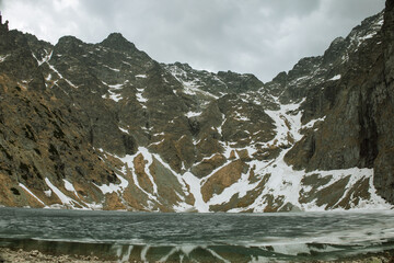 Frozen lake and snowy mountain in Morskie Oko Lake , Zakopane Poland