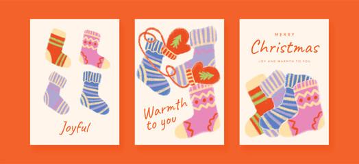 Fototapeta premium Childlike cosy Christmas socks and mittens in soft pastel colours, playful festive winter set. Cute warm knitted elements for greeting cards, posters and holiday design.
