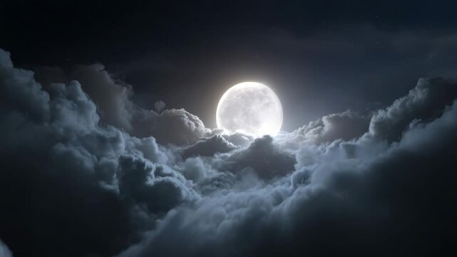 Full moon rising above thick night clouds