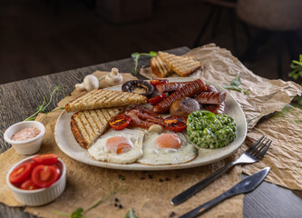 English breakfast served on restaurant table