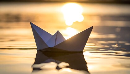 Paper Boat Floating on Water at Sunset.