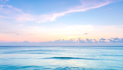Tranquil Ocean Horizon at Sunset with Soft Pastel Sky.
