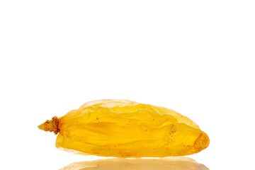 Bright golden sweet raisins isolated on white background, macro.