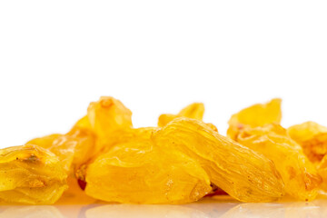 Bright golden sweet raisins isolated on white background, macro.