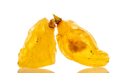 Bright golden sweet raisins isolated on white background, macro.