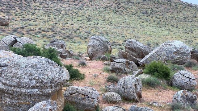 View of the valley of stone balls. Mangystau region.Unique natural places of Kazakhstan. Valley of the Balls. Spherical formations in the Torysh tract were formed about 120-180 million years ago. 4К	